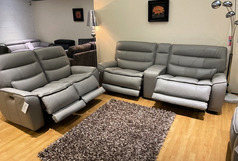 KOMFORT ELECTRIC REECLINER 3 SEATER AND 2 SEATER WITH DRINKS HOLDER £3499 (SWANSEA SUPERSTORE) - Click for more details